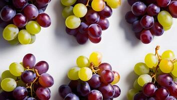Fresh Green and Red Grapes on White Backdrop photo