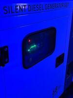 Silent diesel generator set with illuminated control panel photo