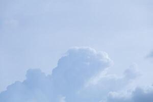 Blue sky background with tiny clouds, Nature cloud blue sky background, Blue Sky with Fluffy White Clouds on a Sunny Summer Day photo