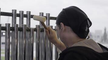 A talented percussion artist performing with a variety of unique and captivating metal instruments. Clip photo