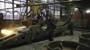 An Industrial Workshop featuring various Welding Activities focused on Aircraft Frame assembly. Stock Clip photo