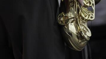 A Close Up of a Talented Saxophonist Playing Captivating Jazz Music on Stage Live. Clip photo