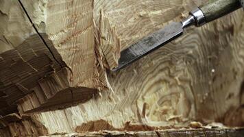 Mastering the Skilled Wood Carving Technique Utilizing Chisels and Hand Tools in Craft. Stock Clip photo