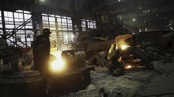 Industrial Workers Engaged in a Metal Fabrication Workshop Setting and Environment. Stock Clip photo
