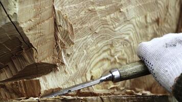 Mastering the Skilled Wood Carving Technique Utilizing Chisels and Hand Tools in Craft. Stock Clip photo