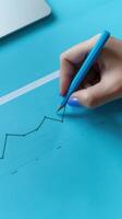 Businessman analyzing investment charts on a virtual screen. Stock market concept. photo