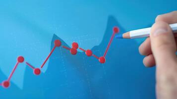 Businessman analyzing investment charts on a virtual screen. Stock market concept. photo