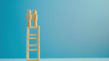 Businessman standing on ladder on blue background. Concept of career growth photo