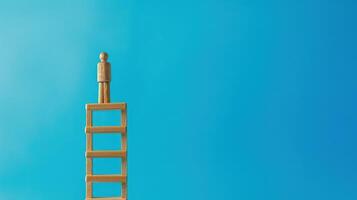Businessman standing on ladder on blue background. Concept of career growth photo