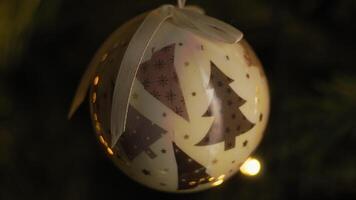 Sad Embroidered Christmas Ball Near Dark Tree video