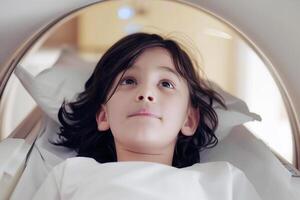 A medical procedure for a child - tomography in a modern hospital for health and disease diagnosis photo