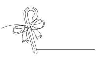 A single line drawing of a a candy cane vector
