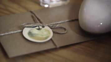 A Beautifully Wrapped Gift Accompanied by a Unique and Thoughtful Tag That Stands Out photo