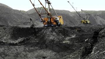 Heavy Machinery Utilized in a Coal Mining Operation for Resource Extraction Efficiency. Stock Clip photo