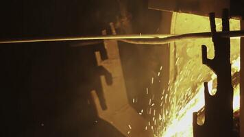 The Fiery Sparks emerging during the intricate Metalworking Process showcase precise craftsmanship. Stock Clip photo
