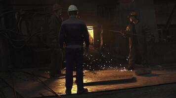 Workers in an Industrial Setting Handling Molten Metal with Expertise and Safety Measures in Place. Stock Clip photo
