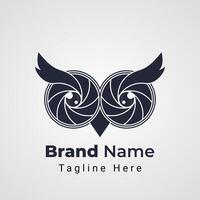 Owl Camera Logo, combination of two camera lens shaped Owl head vector