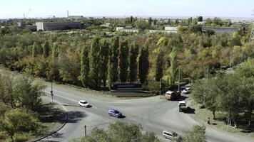A breathtaking autumn view showcasing a roundabout embraced by vibrant and colorful trees. Stock Clip photo