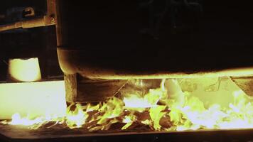 The mesmerizing sight of molten metal flowing efficiently through a foundry workshop. Stock Clip photo