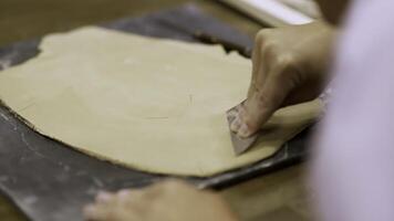 Hands Skillfully Creating Beautiful Clay Art in a Creative Workshop Setting for Learning. Stock Clip photo