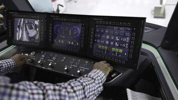 The modern train control panel features advanced technology displays designed for efficiency. Media photo