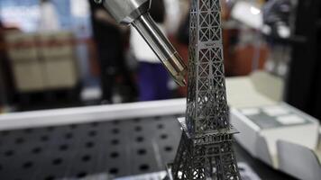 Explore the exquisite craftsmanship of a detailed Eiffel Tower model, designed for enthusiasts. Media photo