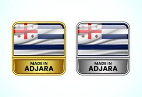 Made in Adjara label icon in gold and silver color. Flag icon set for business vector