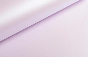 Light pastel paper background with a smooth, silky texture and subtle wavy design. Featuring a photo