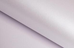 Pastel paper background with a smooth, glossy surface and subtle satin sheen. Featuring delicate photo
