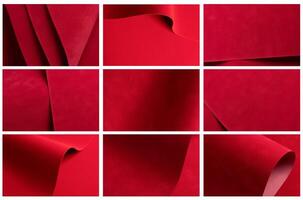 Red velvet paper texture with a soft, matte surface and elegant folds. Scarlet and crimson tones photo