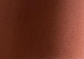 Terracotta velvet textured paper with a soft, matte surface. Elegant and luxurious design in a photo