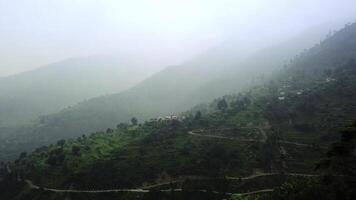 Breathtaking Misty Mountain Landscape Featuring Winding Roads and Scenic Views Everywhere. Stock Clip photo