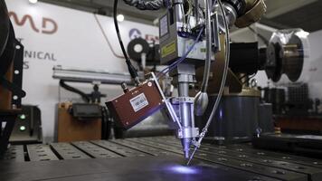 Dubai, UAE - June 2024. The Implementation of Advanced Robotic Welding Technology Demonstrated in RealWorld Action. Media photo