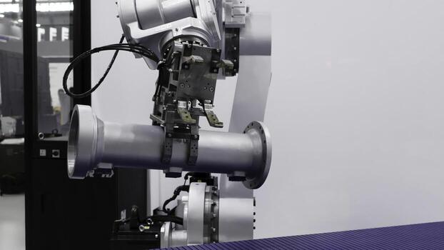 Exploring the Intricacies of an Advanced Robotic Arm within an Industrial Setting. Media photo