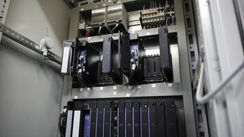 A high tech server rack that comes equipped with multiple integrated storage units for efficiency. Media photo