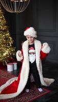 a beautiful stylish family in family clothes at home on a holiday, hugging, having fun, spending time together video