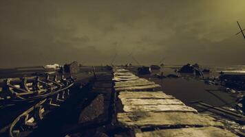 Mysterious abandoned pier under an ominous sky at dusk video