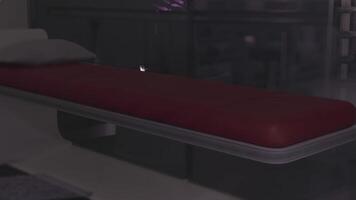 Modern red mattress on a sleek platform bed in a dimly lit room video