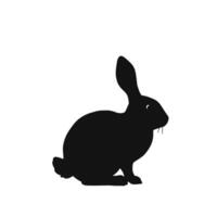 A black and white silhouette of a rabbit vector