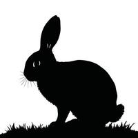 Black rabbit silhouette on grass vector