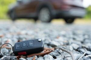 Lost car keys on the ground, Car keys dropped on the floor or fall lying on the street home front. Walking Away From Lost Car Key, can not transport, express, rush time, wast time, emergency photo