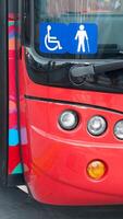 A red bus with a sign on the front photo