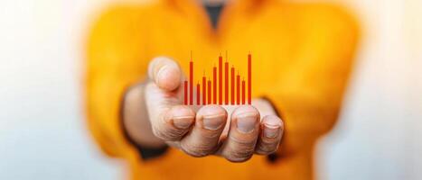 A person holds a digital bar graph, symbolizing data analysis and business growth. photo