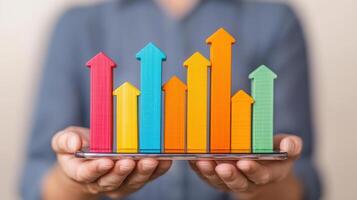 Colorful bar graph on a smartphone, representing growth and progress in business. photo