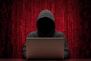 Mysterious figure in a hoodie interacting with a laptop, surrounded by binary code. photo