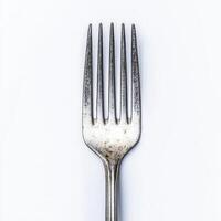 Close-up of a clean silver fork on a white background. isolated on white background. photo