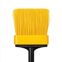 Close-up of a yellow paintbrush ready for artistic projects. isolated on white background. photo
