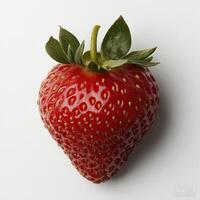 Fresh, ripe strawberry with vibrant red color and green leaves. isolated on white background. photo