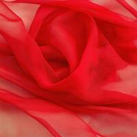 Elegant red fabric creating a luxurious and soft texture. isolated on white background. photo