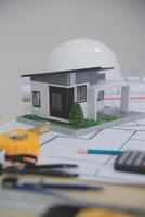 Architects, engineers, contractors working in the office with blueprints, inspection engineers Work analysis for architectural plan, construction project sketch, focus, business construction concept. photo